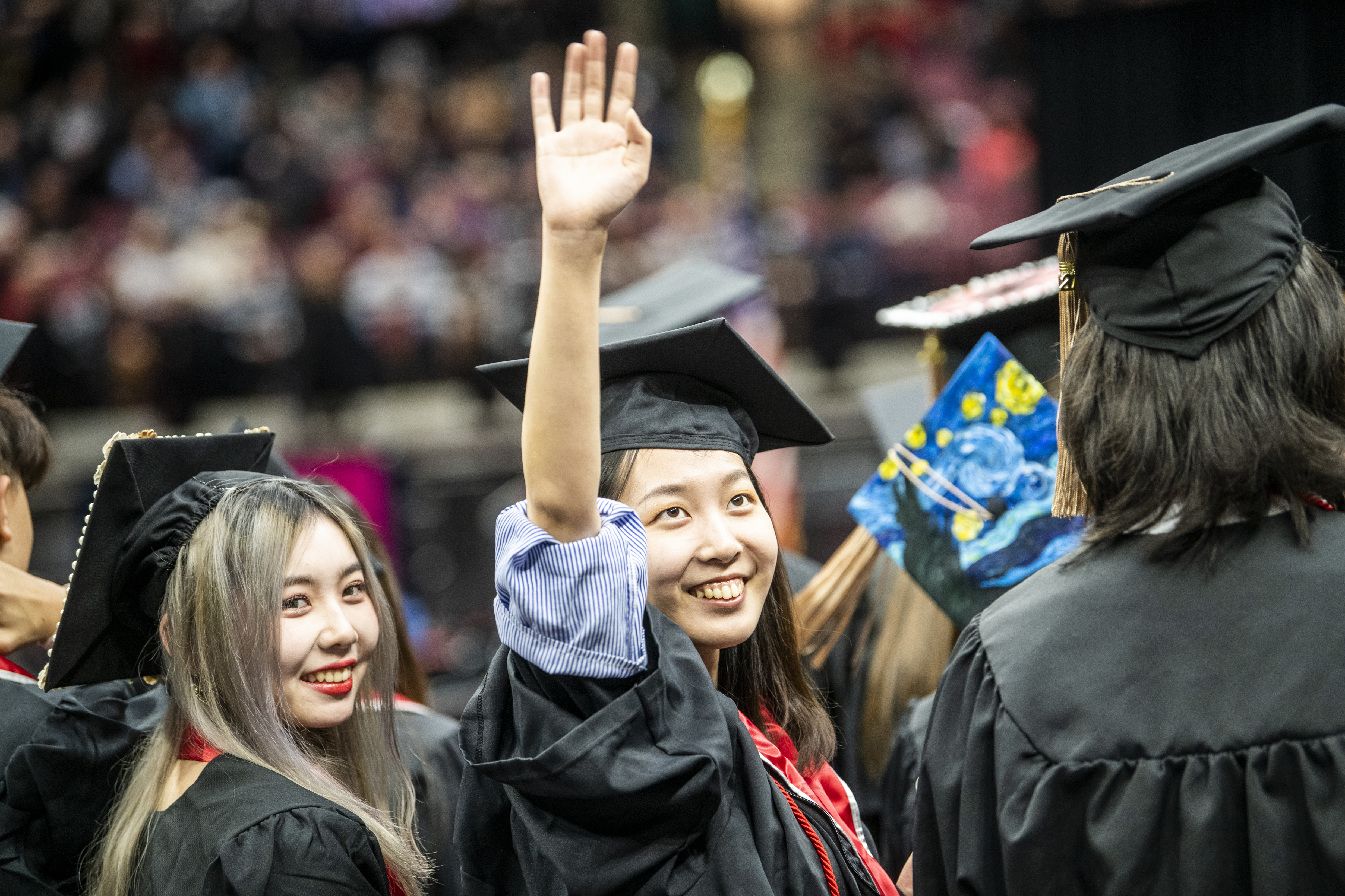 Students graduating during autumn commencement at the Schottenstein Center.