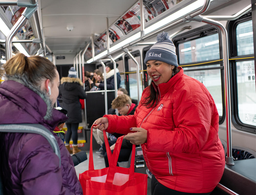 Giving candy out on the Kindness Bus